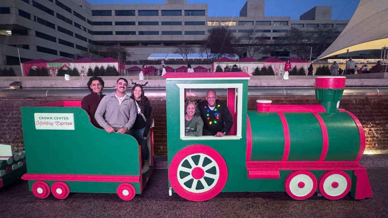 Garrett and his family at the Crown Center Holiday Express