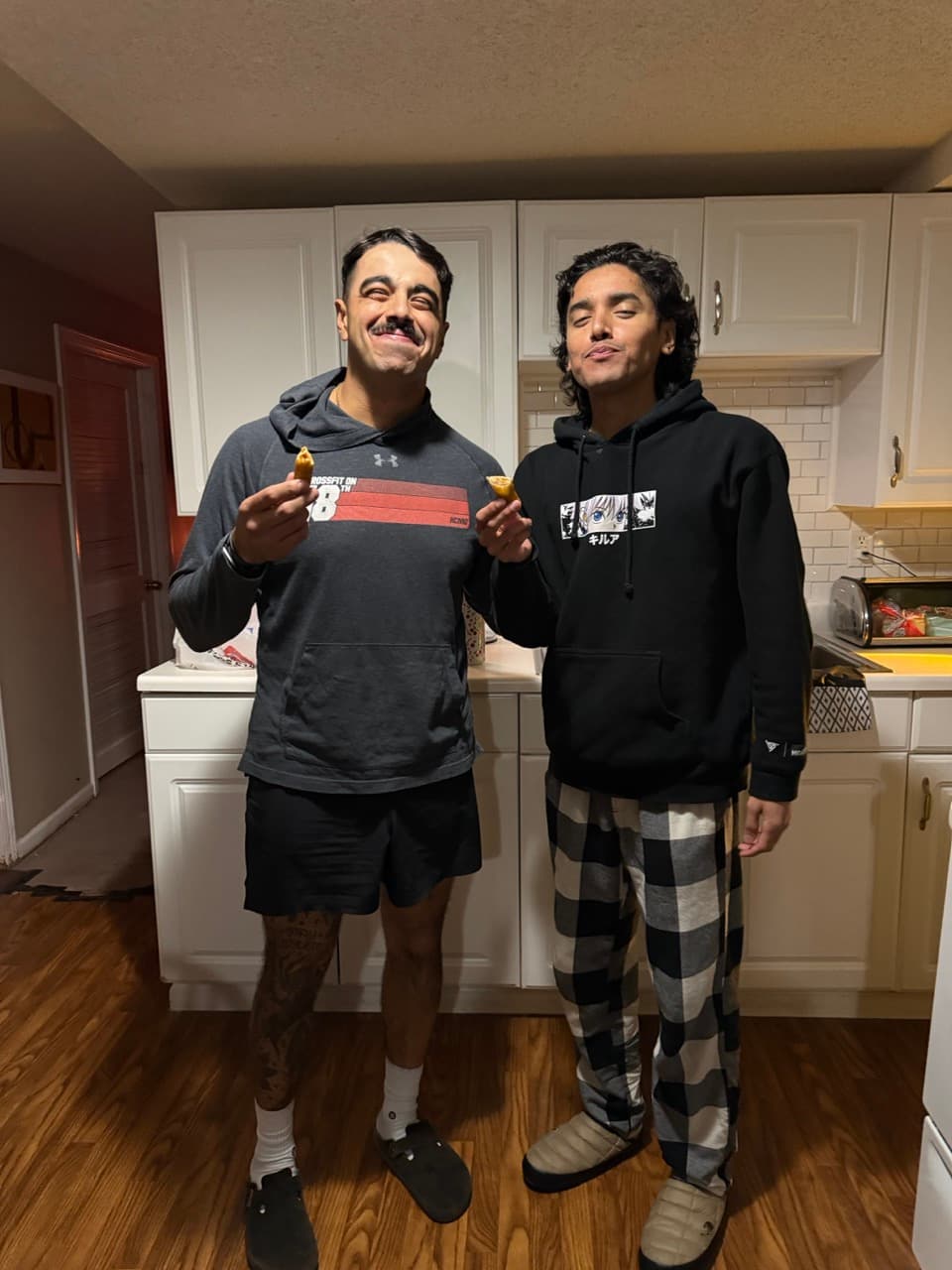Garrett and a friend in the kitchen
